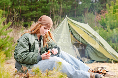 Camping woman tent nature cut sausage