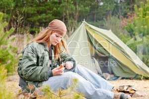 Camping woman tent nature cut sausage