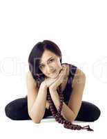 Young woman sit in yoga asana with beads