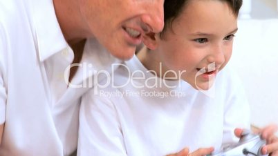 Father & Son with Games Console