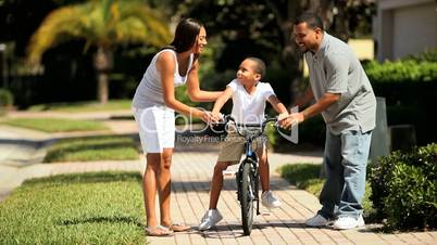 Boy Learning to Ride a Bicycle