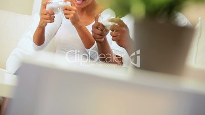 African-American Couple Playing on Games Console