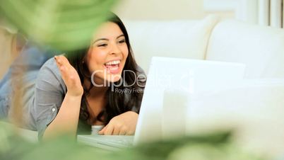 Young Girl at Home Using  Internet Webchat