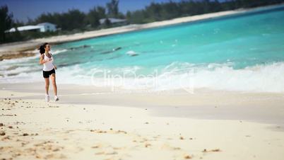 Healthy Caucasian Female Jogging on Tropical Beach