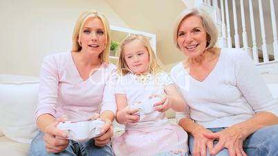 Three Generations of Females with Games Console