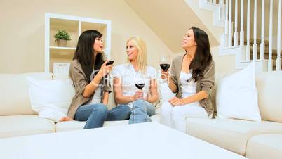 Girlfriends at Home Drinking Wine