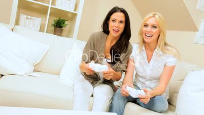 Two Young Females on Games Console