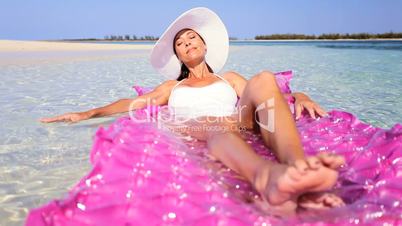 Caucasian Female on Inflatable Water Raft