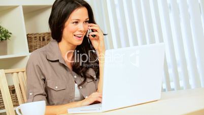 Girl Using Laptop & Smartphone