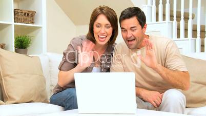Caucasian Couple Using Internet Webchat