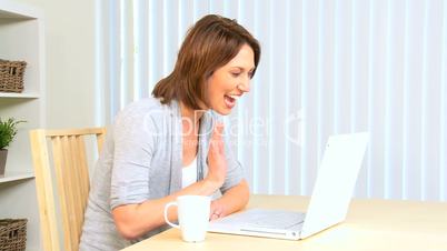 Relaxed Young Girl Using Internet Webchat