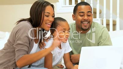 African-American Family Using Online Webchat