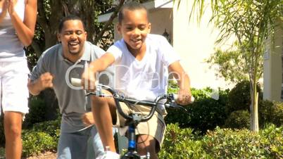 Boy Learning to Ride a Bicycle