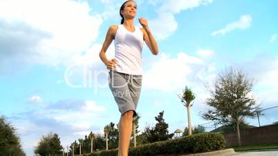 Pretty Girl Outdoors Jogging