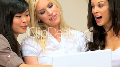 Portrait of Females Using Laptop at Home