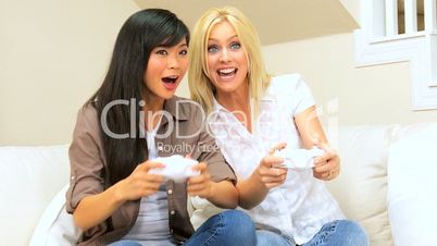 Multi-Ethnic Female Friends Playing Electronic Games