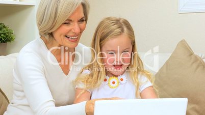 Grandma & Grandchild with Laptop