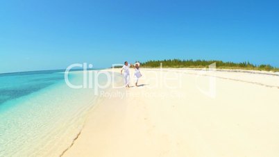Caucasian Couple on Luxury Island Vacation