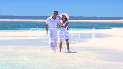 Attractive Couple on Beautiful Island Beach