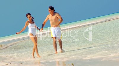 Happy Couple in Swimwear on Paradise Island