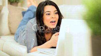 Young Girl at Home Using  Internet Webchat
