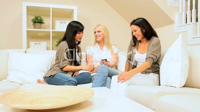 Girlfriends Using Smartphone at Home