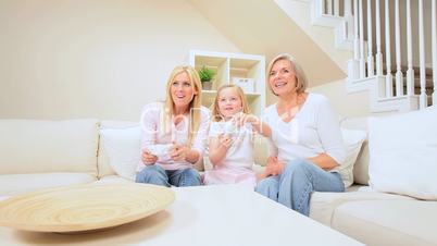 Three Generations of Females with Games Console