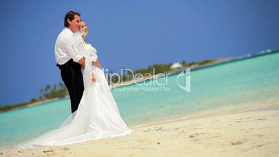 Barefoot Caucasian Couple in Wedding Clothes