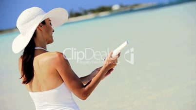 Slim Brunette Female Using Sun Protection Cream