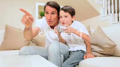 Father & Son Playing Games Console