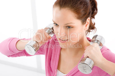 Fitness happy woman exercise dumbbell