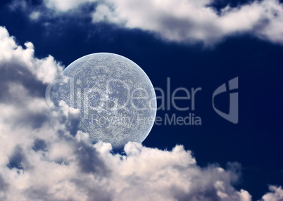 The moon in clouds