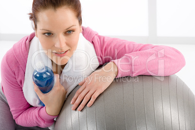 Fitness woman relax water bottle ball sportive