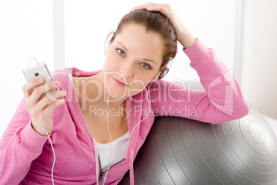 Fitness woman listen music mp3 relax