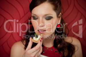 Cocktail party woman eat appetizer evening dress