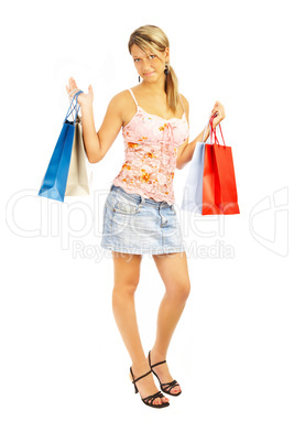 Comparison shopping. Girl with bags.