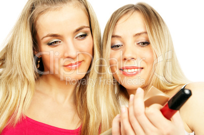girls on a white background. Make-up.