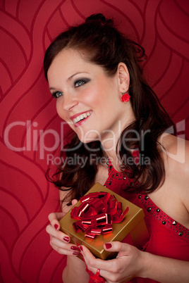 Cocktail party woman hold present evening dress