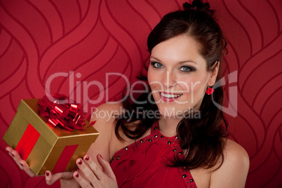 Cocktail party woman hold present evening dress