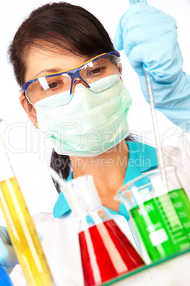 scientist in laboratory with test tubes