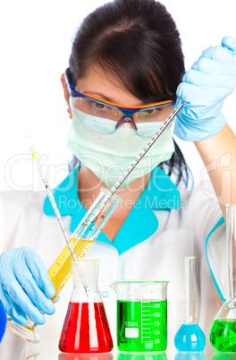 scientist in laboratory with test tubes