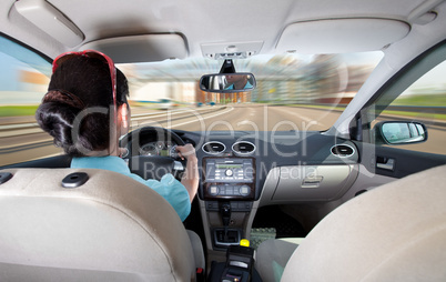 women driving a car