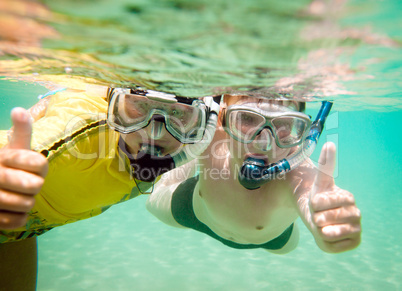 Two boys underwater