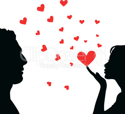 Man and woman face silhouette with heart.