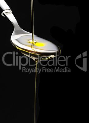 olive oil on a spoon