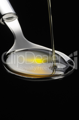 olive oil on a spoon