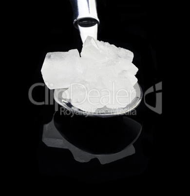 crystal sugar on a spoon