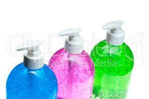 hair gel bottles over white