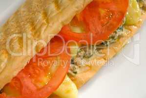 tuna tomato and cheese grilled panini sandwich