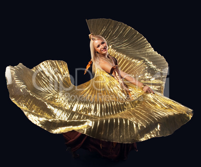 Beauty blond woman dance with flying gold wing